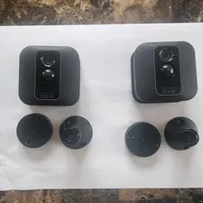 2 Blink XT2 Indoor/Outdoor Add On cameras with mounting brackets. Excellent