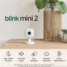 Blink Mini 2 - Compact indoor plug-in smart security camera, Full 1080p HD video