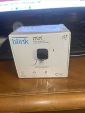 Blink Mini Compact indoor plug-in smart security camera 1080p HD, New/Sealed  A1
