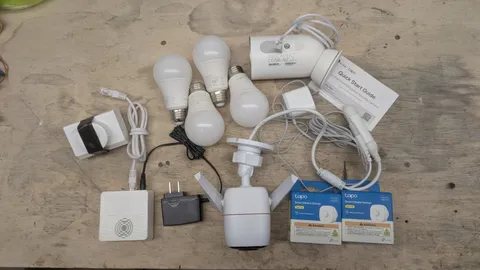 TP-Link Tapo Smart Home Package: 2 Outdoor Cameras, H200 Hub, 8 Color Bulbs, and
