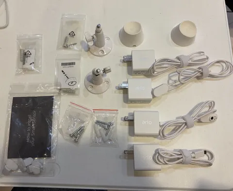 Arlo Cameras Accesories Lot. Chargers, Power Adapters, Wall Mounts & Hardware
