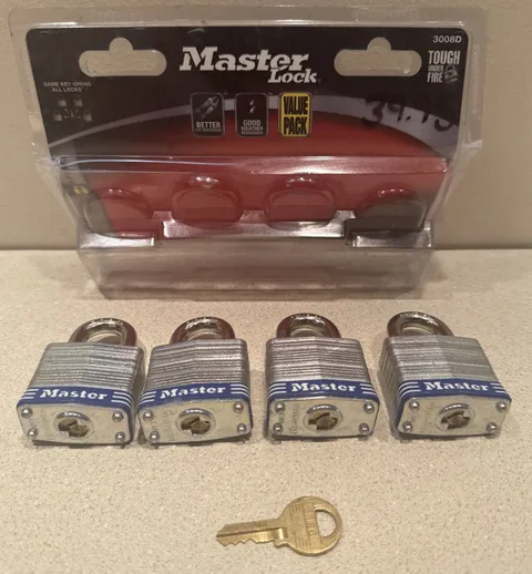 4 Pack Master Lock 3008D Laminated Steel Padlock w/ 1 Key for All Four. Open Box