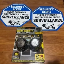 Decoy security Cameras and Two large Secuirty Alert signs