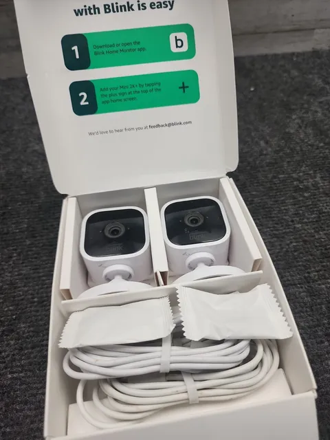 Used Blink Mini 2k+ 2 Pack White Indoor Outdoor Security Cameras