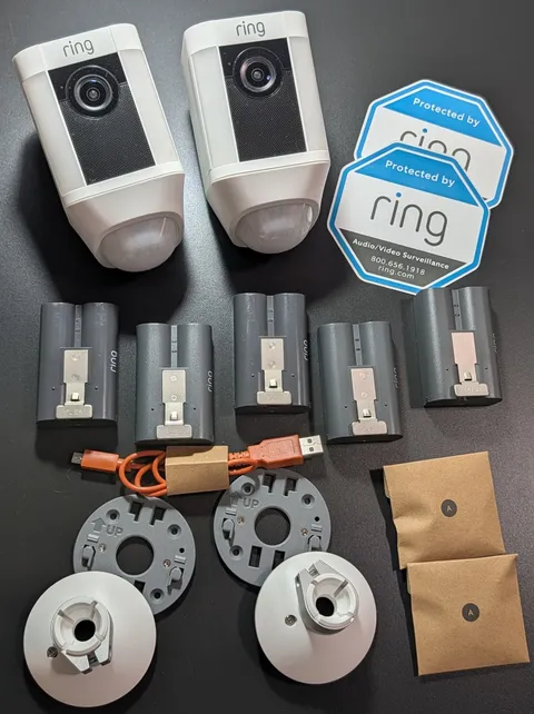 (2) Ring Spotlight Cams Battery Or Powered Surveillance + Mounts + (5) Batteries
