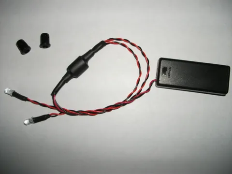 BATTERY POWERED DUAL FLASHING BLUE LED