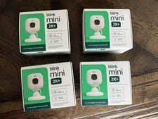 Four Blink Mini 2K+ Indoor Outdoor Plug-In Security Camera White Color