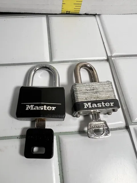 2 Masterlock small  Lock & Key  1 key each # 31