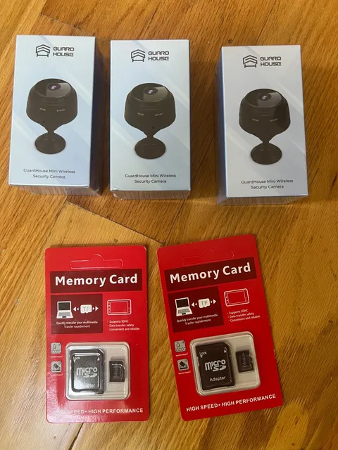 3 GuardHouse Mini Wireless Security Cameras - Plus Two 64GB Memory Cards - NEW!