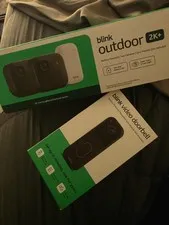 Blink Outdoor 2K+ 2-Camera System with Sync Module & Doorbell Head to Toe