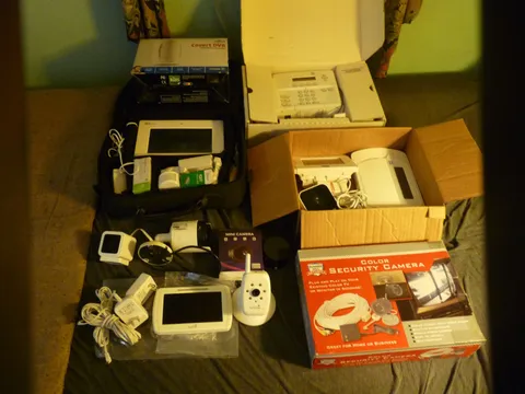 lot of security systems and cameras (as is) read description