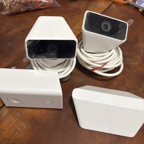 2 Xfinity XCAM2 HD Indoor Outdoor Security Camera w/ 1 XW4 Adapter & 1 sensor