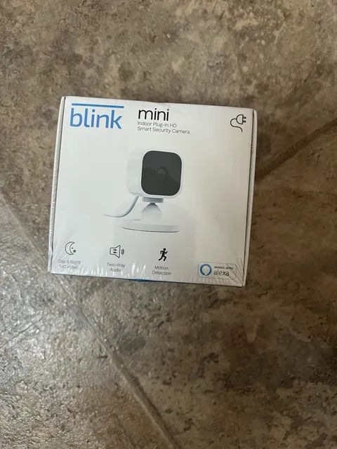 Blink Mini Compact indoor plug-in smart security camera 1080p HD, Brand New