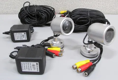 2/pics Wired Infrared Cameras with 2/pics 100ft Cables and 2/pics Power Supply.