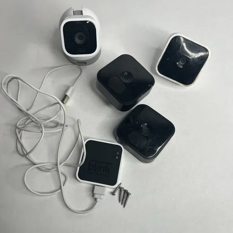 Blink Camera System Used 4 Cameras 1 Sync Module 2
