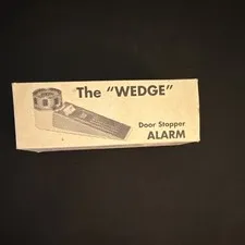 The WEDGE Anti-Theft Door Stopper Alarm, Battery Powered, White Metal