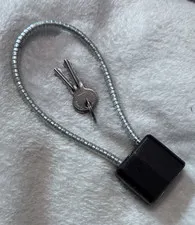 This is a Gun LockKeyed Cable Lock w/ 2 Keys, Black/Silver Metallic Finish