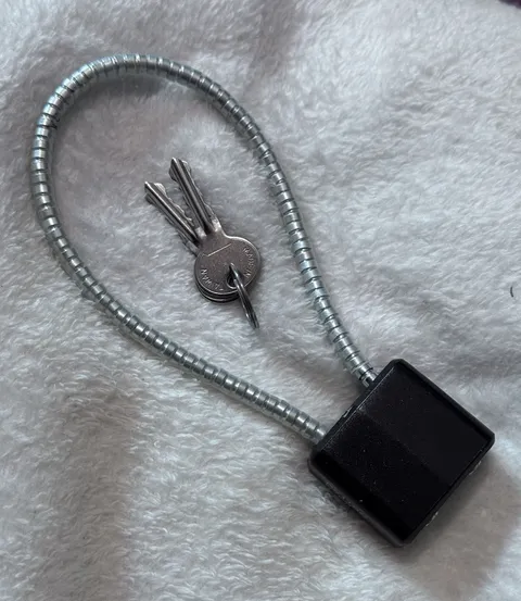 This is a Gun LockKeyed Cable Lock w/ 2 Keys, Black/Silver Metallic Finish