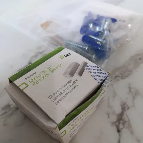 NIB GE Interlogix TX-1012-01-1 Micro Wireless Sensor, Battery Magnet & Spare HW