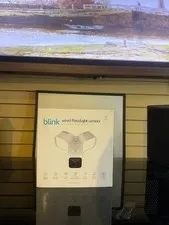 BLINK Wired Floodlight Camera Smart Outdoor Security, 2600 Lumens, White In-Hand