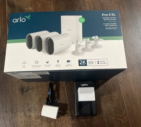 Arlo Pro XL Security Bundle Plus 2 Battery Charger and Extra Batteries. Used