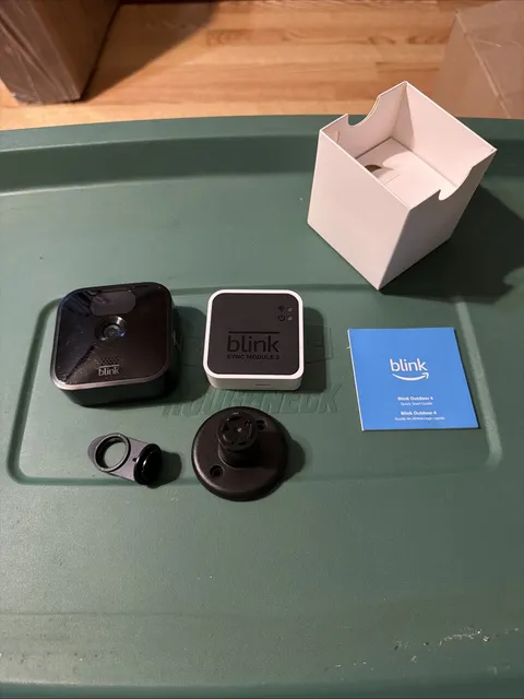 blink Outdoor 4 wireless camera With Sync Module New Open Box Left From  Instal