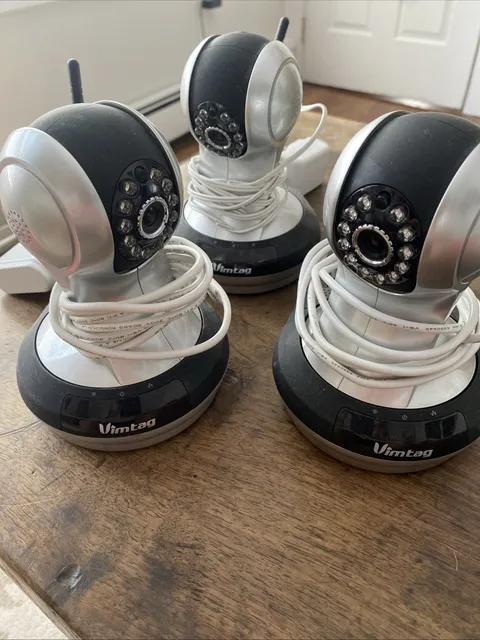 VIMTAG SECURITY CAMERA VT-361 - 3 CAMERAS WITH APPLICABLE HARDWARE AND MANUALS.