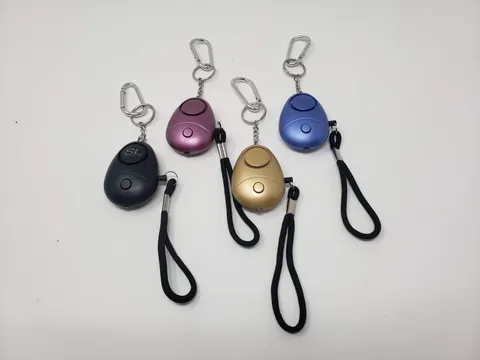 Personal Alarm keychain for WOMEN/KIDS siren 140 DB LOUD & LED light (4 PACK) NE