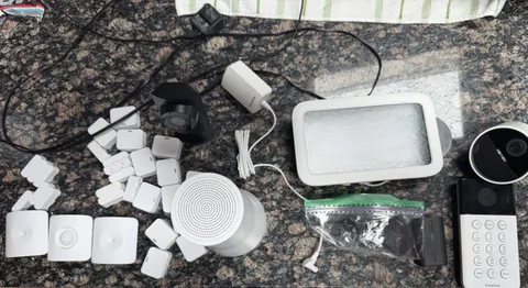 SimpliSafe system with lot of sensors and two cameras.