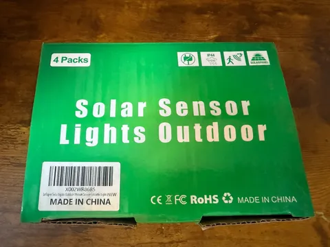 4 Pack LED Solar Power Lights Outdoor Garden Security Lamps. NIB